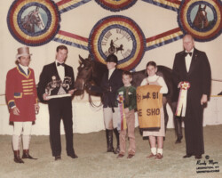 Kerrymor's Autumn Hope and Katie Dalzell receive the John L. Randazzo Memorial Challenge Trophy for winning the Connemara Hunter Championship in 1981 at the St. Louis National Charity Horse Show. Hope won the trophy enough times to take it home with her.