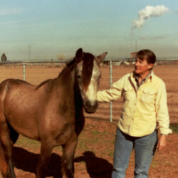 Marian Molthan, MD, likely with Foxglove John Barleycorn II, at Foxglove Farm in Laveen, Arizona, in the mid-1980s. Marian Molthan, MD, likely with Foxglove John Barleycorn II, at Foxglove Farm in Laveen, Arizona, in the mid-1980s.