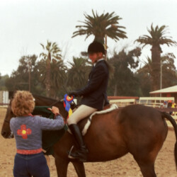Kerrymor Lady Diana and Terry McKenna receive a blue ribbon at the West Coast Connemara Show in 1986 in Ventura, California.