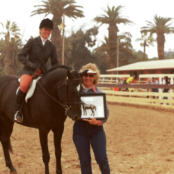 Kerrymor Spotlight and Joan McKenna Jr. receive their trophy from Charlene O'Neil at the West Coast Connemara Show in 1986 in Ventura, California.