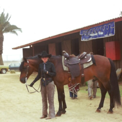 Spring Ledge Irish Whiskey, owned by Foxglove Farm, with Kathy McCarthy at the 1986 West Coast Connemara Show in Ventura, California. Whiskers competed in hunters, Western and driving classes. Trainer Dave Johnson looks on.